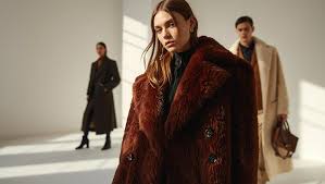 Long, Luxe, and Dramatic: Fall 2025's Coat Trend Is All About Impact